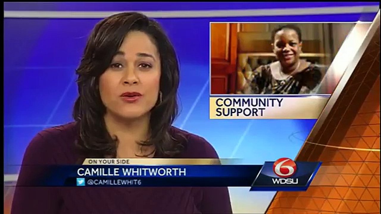 Community group rallies around businesswoman facing federal charges