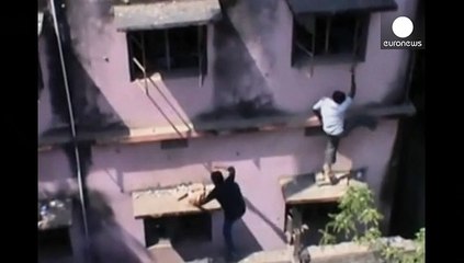 Reaching new heights: Parents in India scale walls to 'help students cheat'