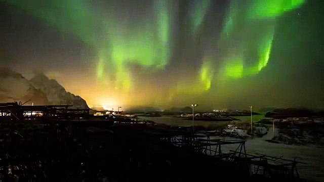Hunting the Light : The Northern Light in Henningsvær, Lofoten Islands. Aurora Borealis in