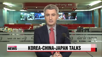 China tells Japan to "face history squarely" at trilateral talks