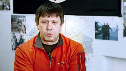 In Ukraine, some Russians take up arms against Putin