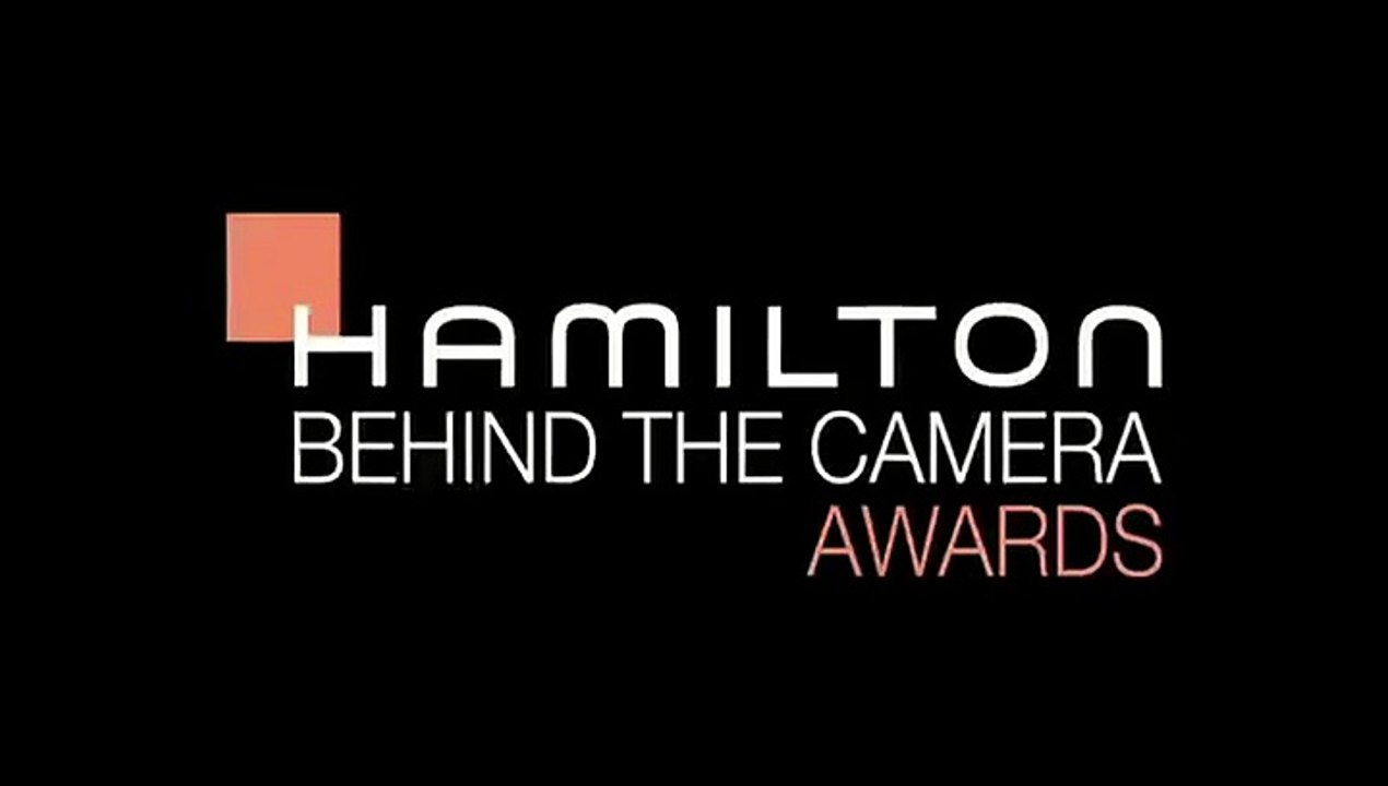 Robert Pattinson Presents Chris Weitz with Award 2011