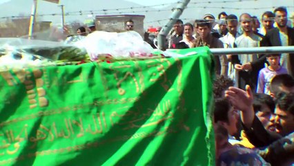 Hundreds of Afghans bury woman beaten to death by mob