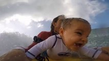 9-month-old baby surfing with his mother is so cute!