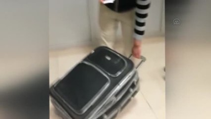Valiz İçinden Çıkan Kadın