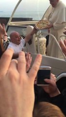 Pope Francesco accepts the pizza made by Antonio Greco of Don Ernesto restaurant in Naples