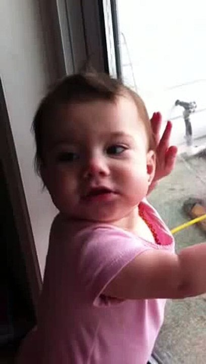 Baby Keauni licking the window