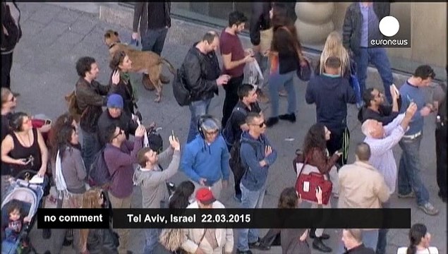 Artist shocks Tel Aviv with 'floating in mid-air' stunt