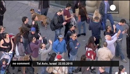 Artist shocks Tel Aviv with 'floating in mid-air' stunt