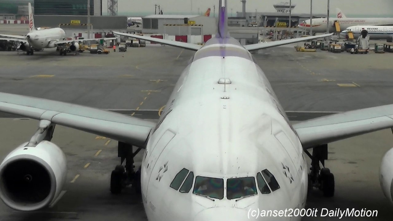 Airbus A330 Thai Airways. Pushback at Hong Kong Airport. Flight TG603 to Bangkok. HS-TEQ