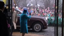 Schoolkids brave wind and rain to see Queen