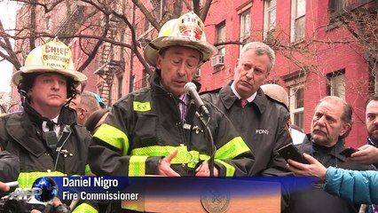 Nineteen hurt as blast, then fire bring down New York buildings