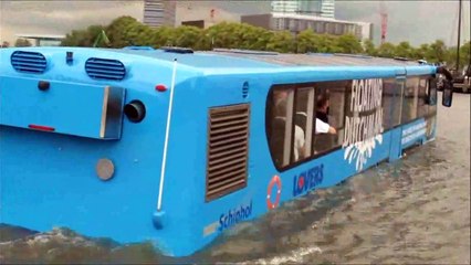 Crazy bus drives into the Amsterdam Canals