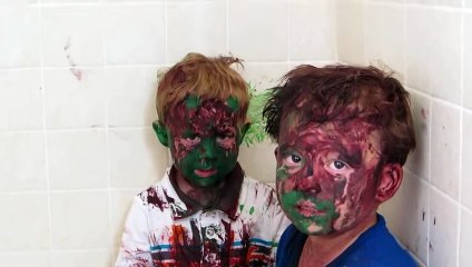 Kids play with paint a get it all over their faces