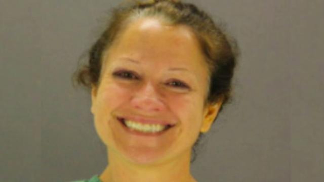 Why is This Woman's Mugshot So Happy?