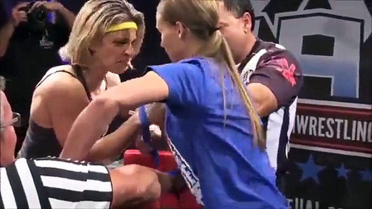Female Arm Wrestler Goes Crazy After Her Hard Fought Win!
