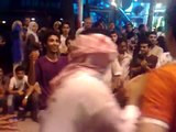 Arab youth dancing in Bukit Bintang with Malaysian people