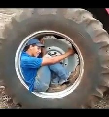 Man in tractor tire