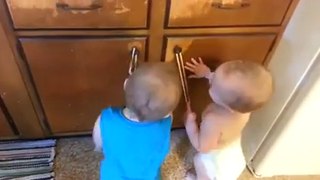 Babies playing with Rubber Band