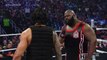 Roman Reigns spears a returning Mark Henry through the barricade  SmackDown, March 12, 2015