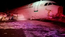 An Air Canada flight crash lands and slides off runway