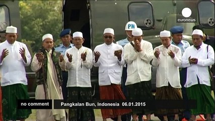 Clerics fly over AirAsia crash site to pray for victims - no comment