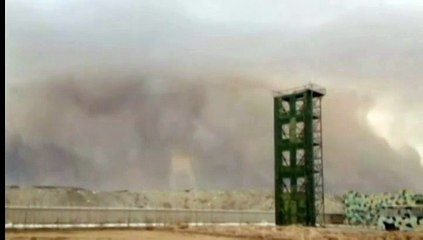 Chine :  un vent de sable plonge une ville dans le noir