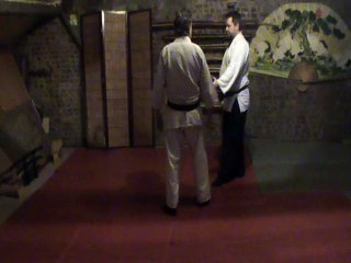 Gyaku hanmi katate dori : reaction ikkyo to tsuki