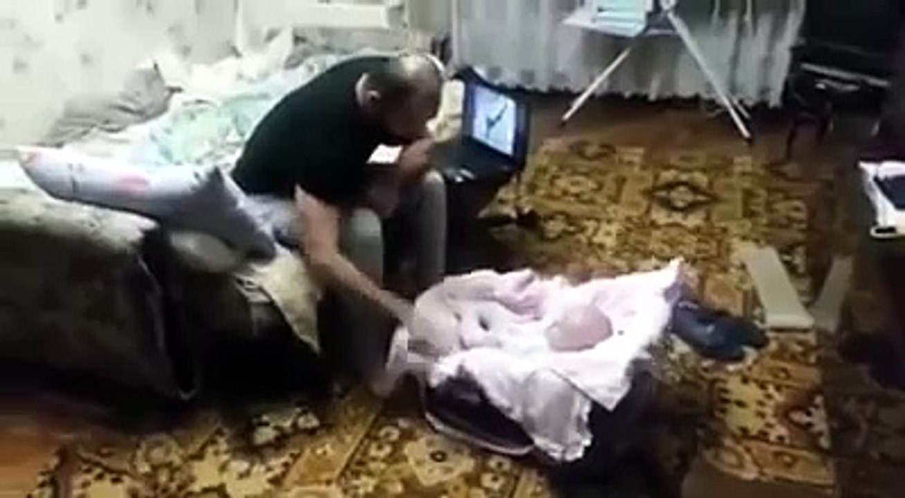 Cat defends baby
