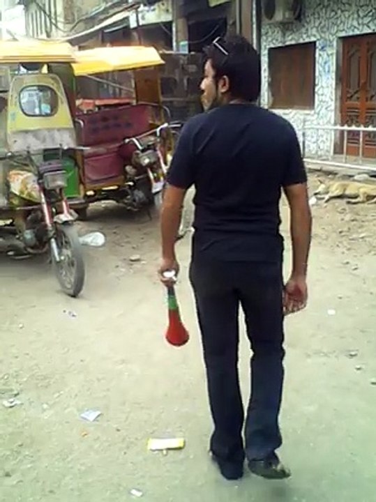 pakistani boy and sleeping dog