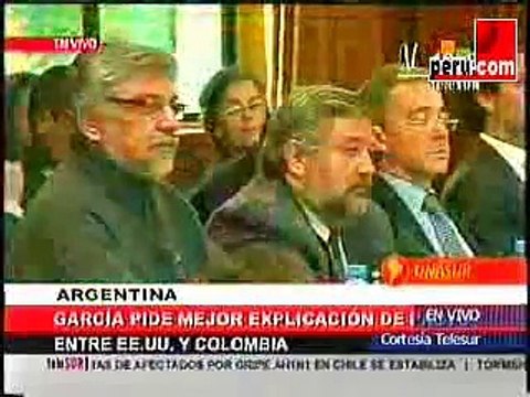 Alan García le bromea a Hugo Chavez en cumbre de la UNASUR