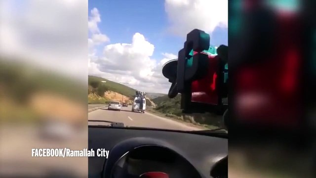 Dunya News - Watch as van carrying passengers on its roof swerves out of control - sending them flying