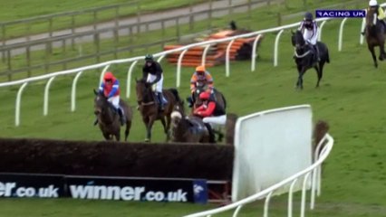 Teenage jockey walks away unscathed after spectacular fall