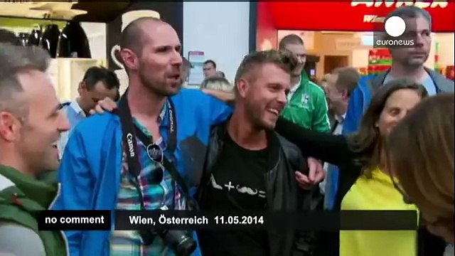 Eurovision winner Conchita Wurst returns home in triumph - no comment