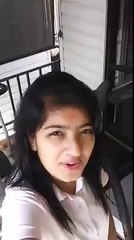 A beautiful girl singing a beautiful song taking selfe
