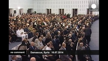 Syrian President Bashar al Assad is sworn in for a new seven-year term - no comment