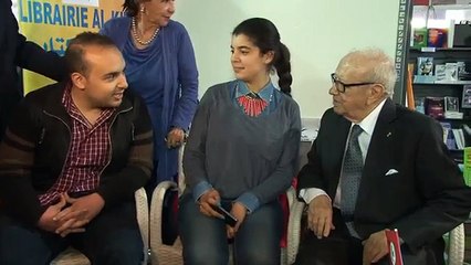 اليوم  قائد السبسي و الغنوشي يتصافحان في معرض الكتاب و يشجعان على المطالعة