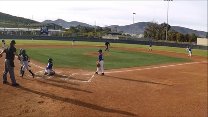 Youth Baseball Player Hurdles Catcher, Like a Boss