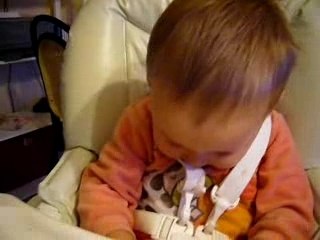 Malo dans sa chaise haute