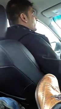 American police officer abusing a Pakistani cab driver