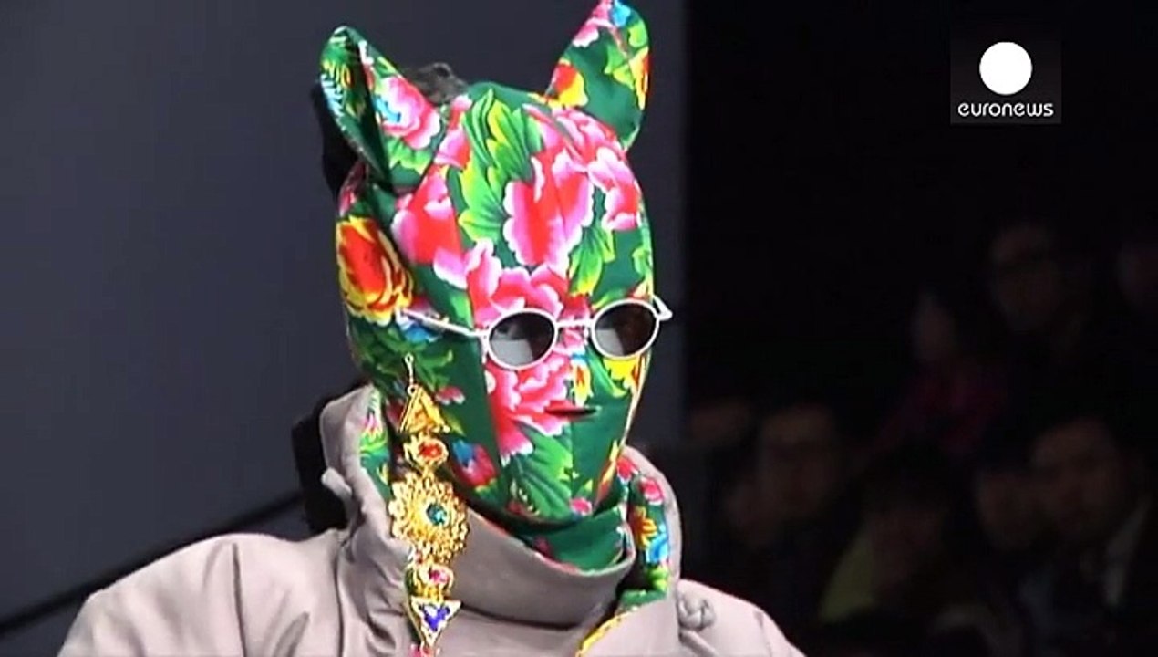 Designers go back to their roots at Beijing and Pakistan fashion events