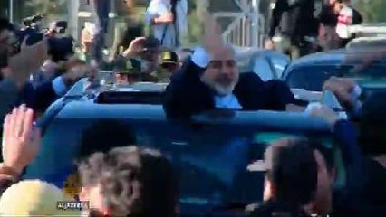 Iran's top diplomat gets warm welcome in Tehran