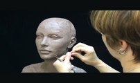 Sculpting a female head in clay. Sculpting tutorial and demo.