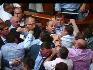 politicians FIGHT in Ukrainian halls of Parliament