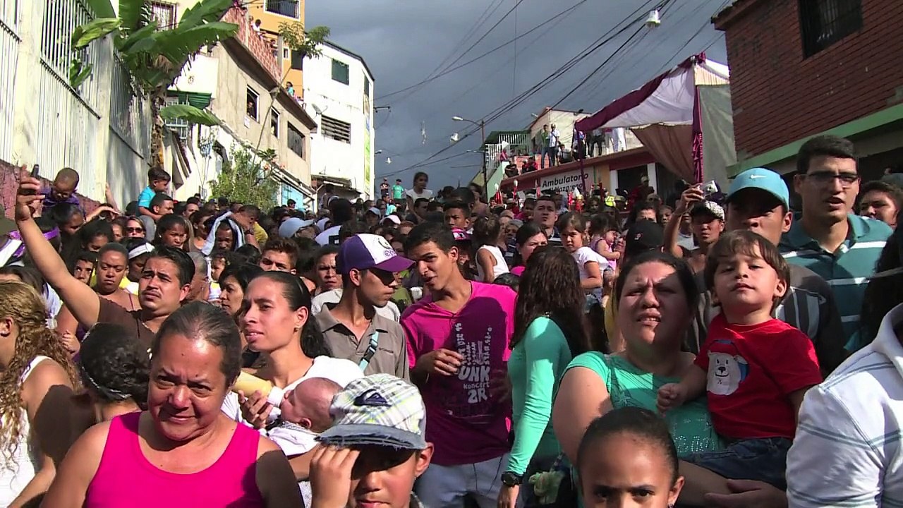 Catholics reenact Christ crucifixion in Caracas slum