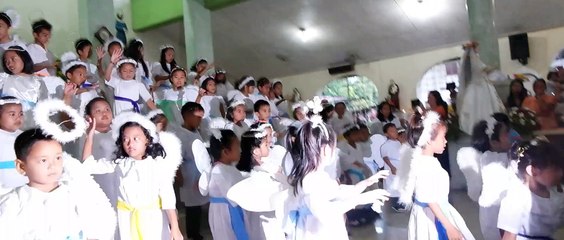 Easter Sunday 2014. The 'Angel Choir' in their finale song at St Isidore Parish Church in Medina,Mis.Or.,Philippines.