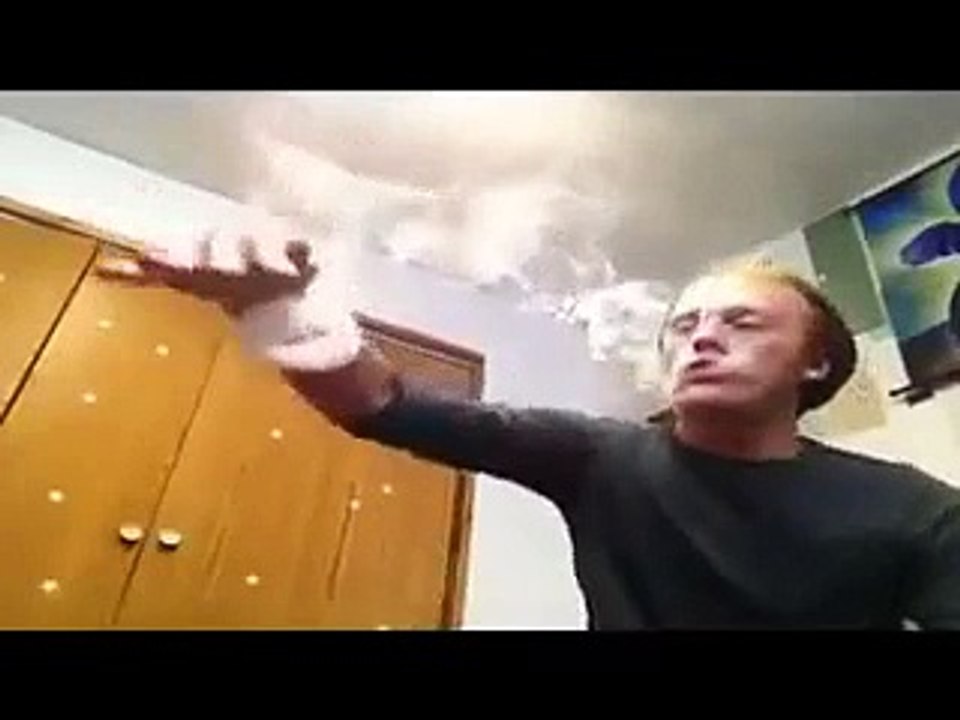 Guy playing with sheesha smoke