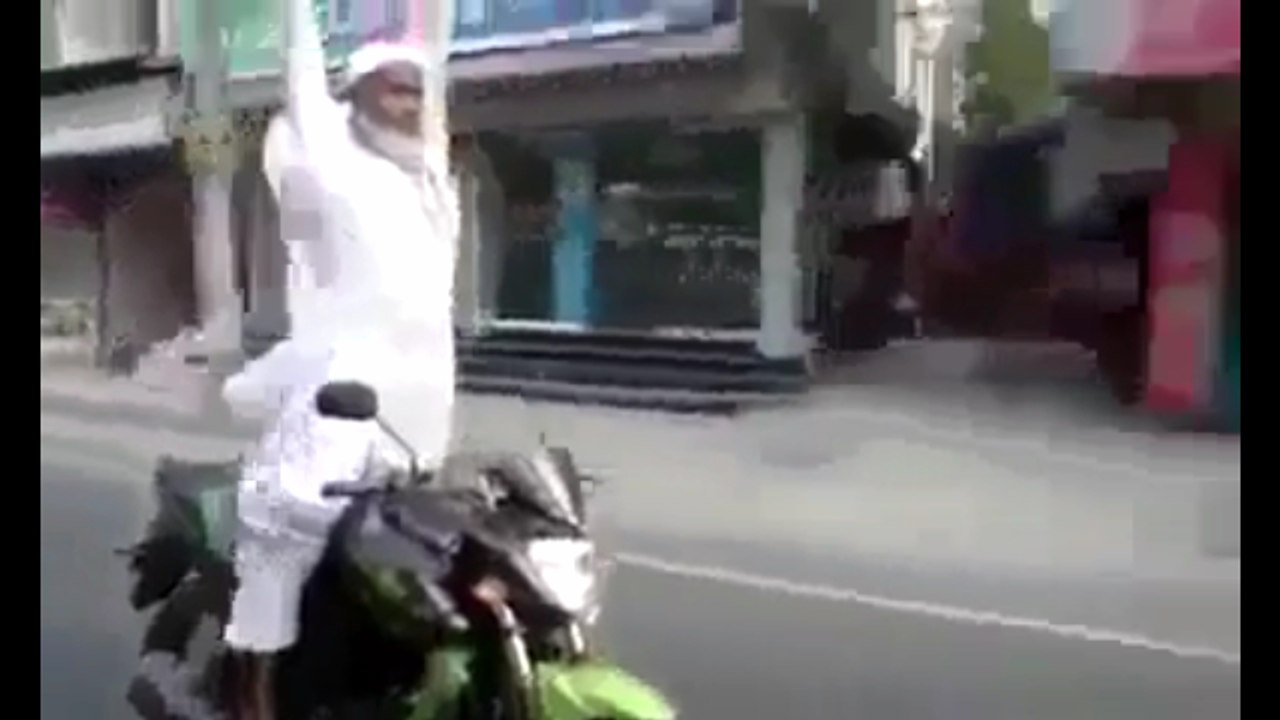 Funny  BaBa JEE stunts on Motorcycle