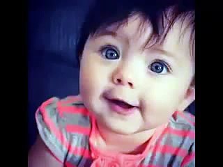 A cute baby reciting dua and makes fun with mother