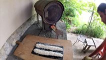 Rocket stove oven cooking - Baking bread